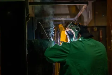 person welding
